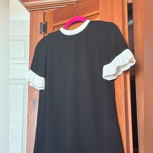 Cece Black & white blouse with White Pleated Sleeves